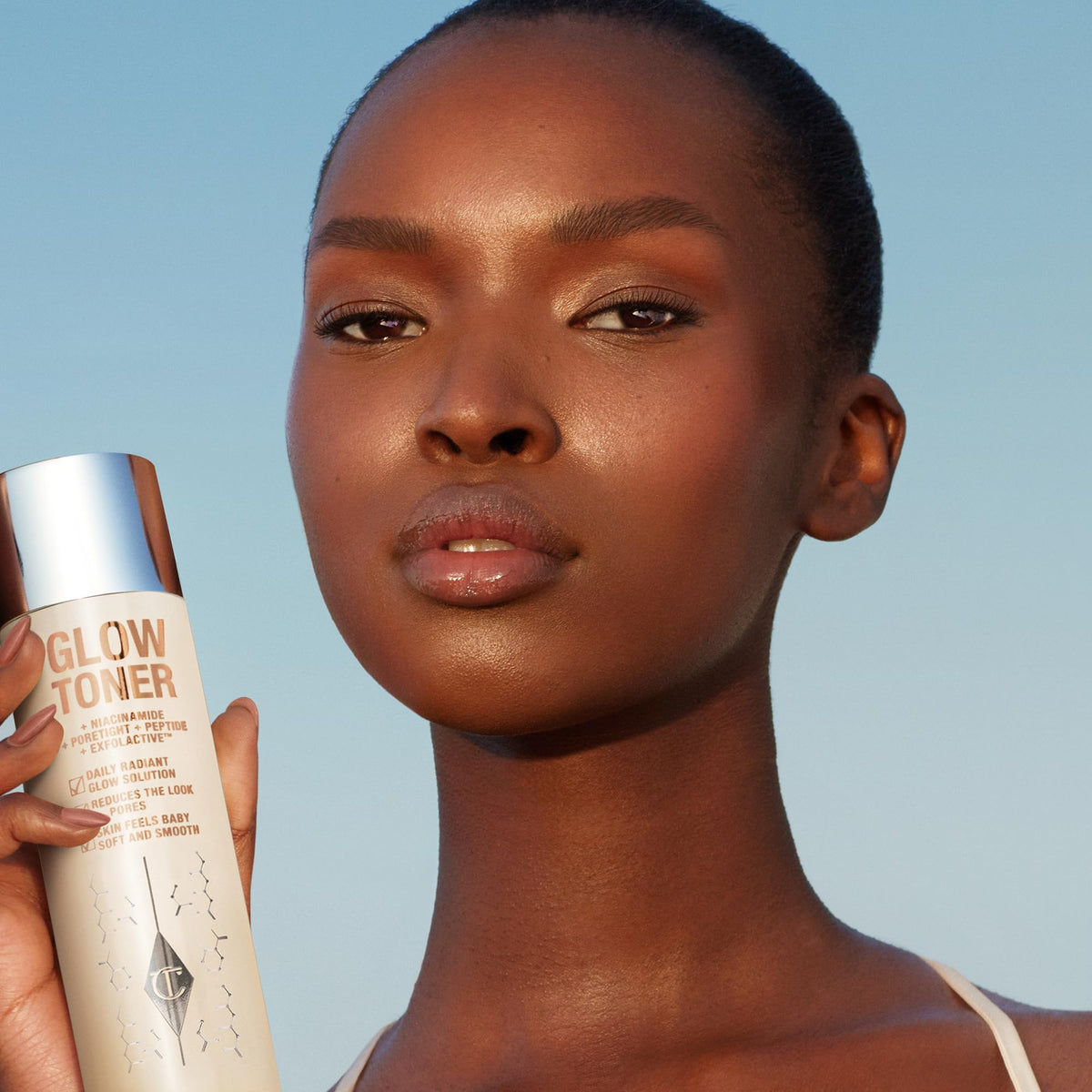 Charlotte Tilbury toner on cotton pad illustrating easy application and gentle exfoliation