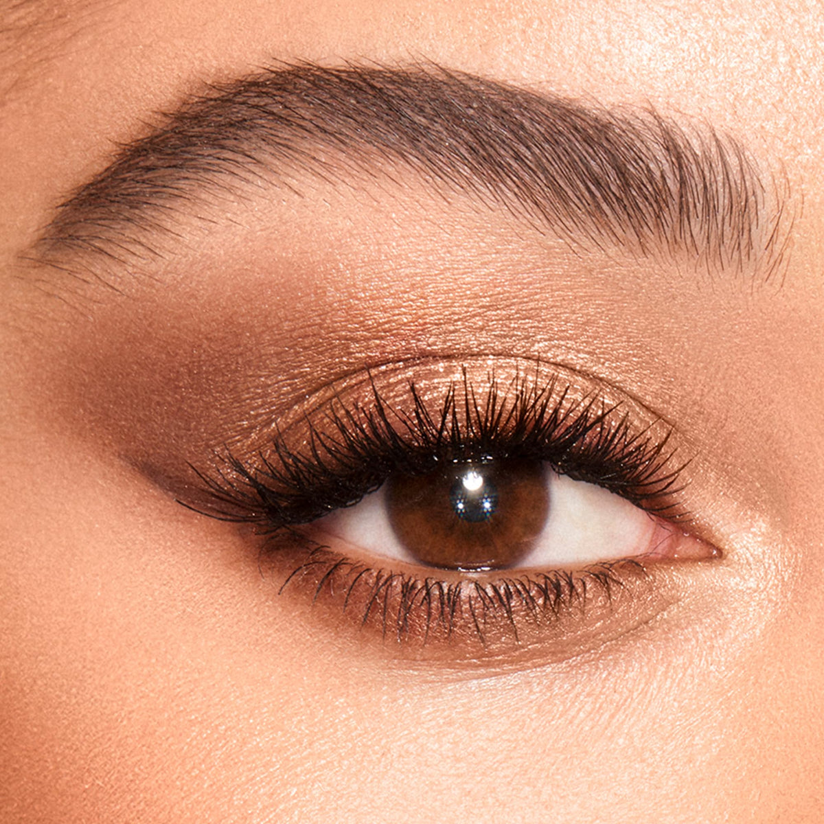 Charlotte Tilbury close-up of powder texture showing creamy pigment and blendable finish