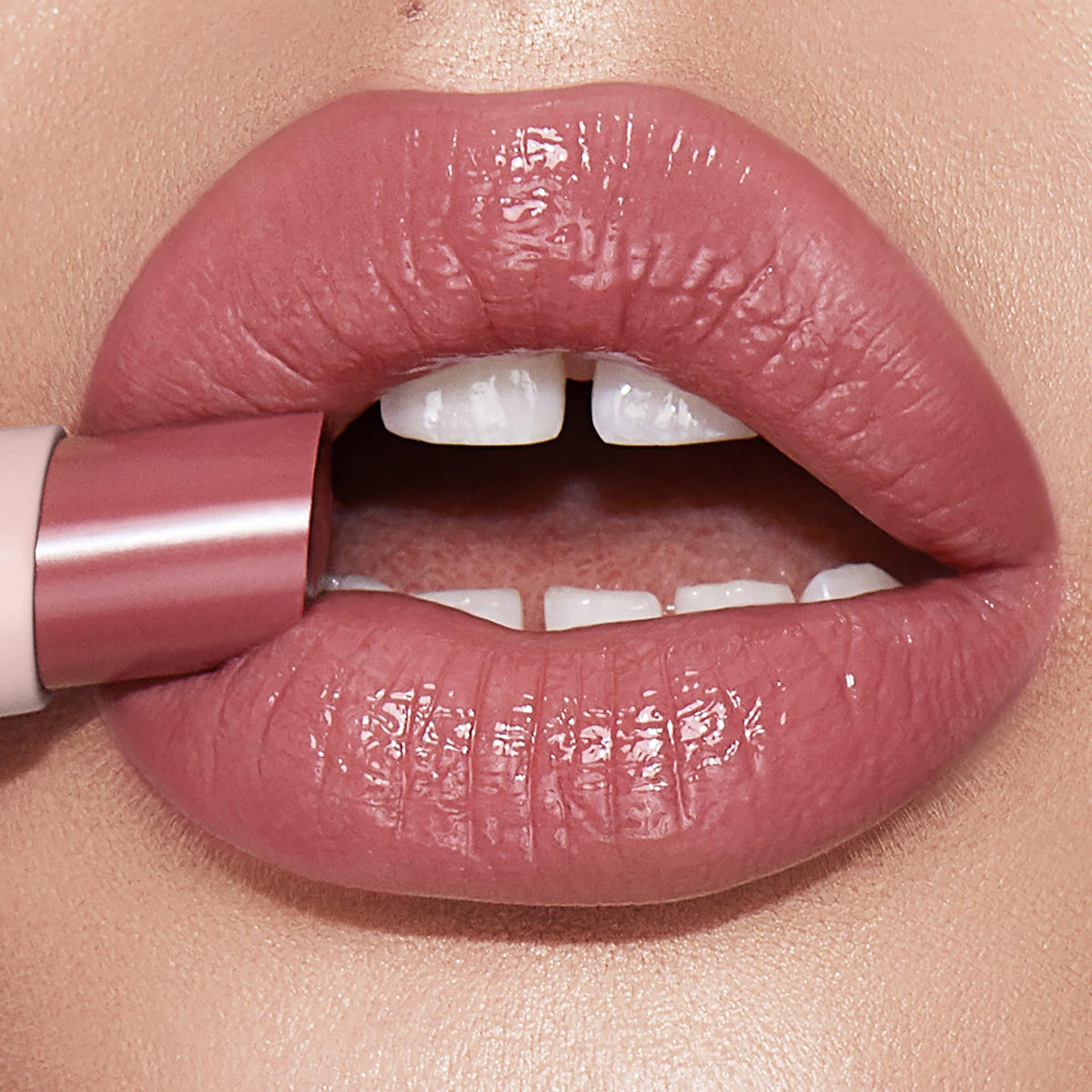 Charlotte Tilbury closeup of fondue-like Happikiss texture illustrating smooth glide