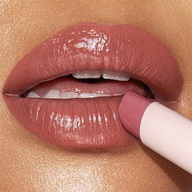 Charlotte Tilbury packaging and label of Happikiss highlighting ingredient details
