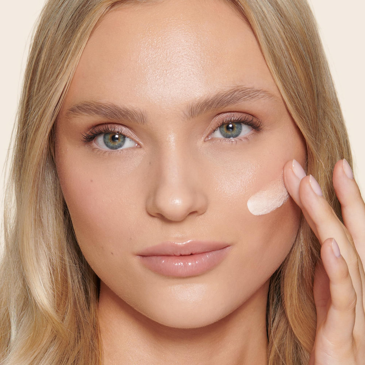 Charlotte Tilbury swatch on hand being blended, demonstrates tone‑adapting pigments