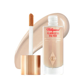 Charlotte Tilbury front packaging showing product and shade, highlights effortless glow