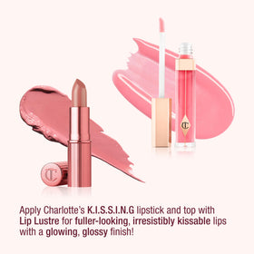 Charlotte Tilbury Icon Baby swatch on skin showing warm nude-rose color and luminous pearly finish