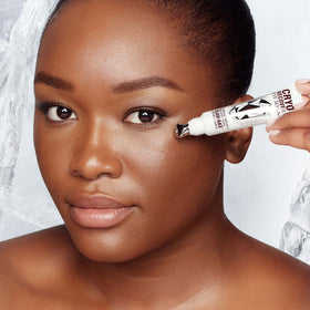 Charlotte Tilbury label and ingredients detail highlighting peptide and caffeine actives