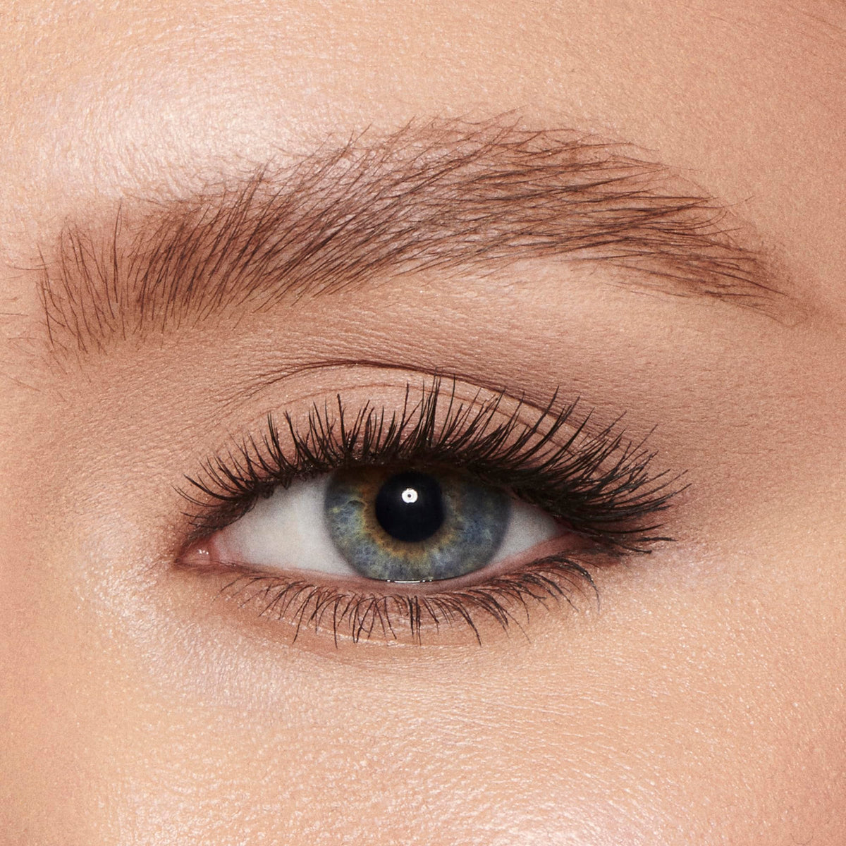 Charlotte Tilbury gel beside brow pencil showing compact travel-friendly size