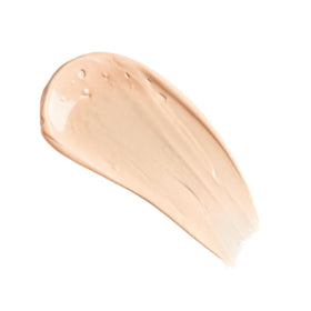 Charlotte Tilbury bottle styled on bathroom shelf suggesting easy daily use