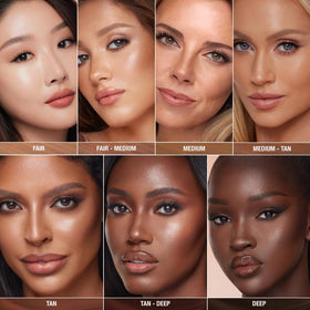 Charlotte Tilbury lifestyle vanity shot with wand staged for everyday beauty confidence