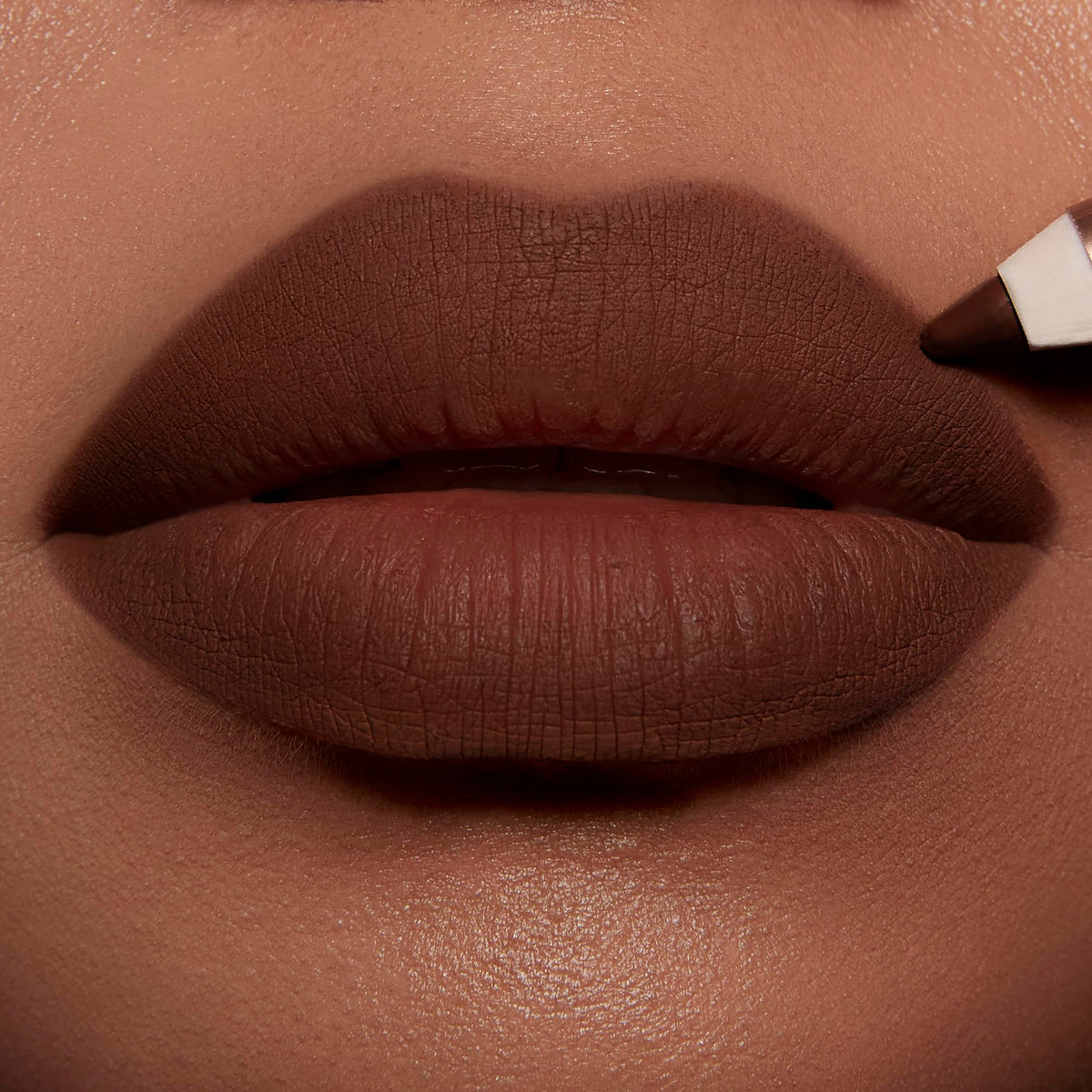 Charlotte Tilbury close-up on lips showing precise lining benefit