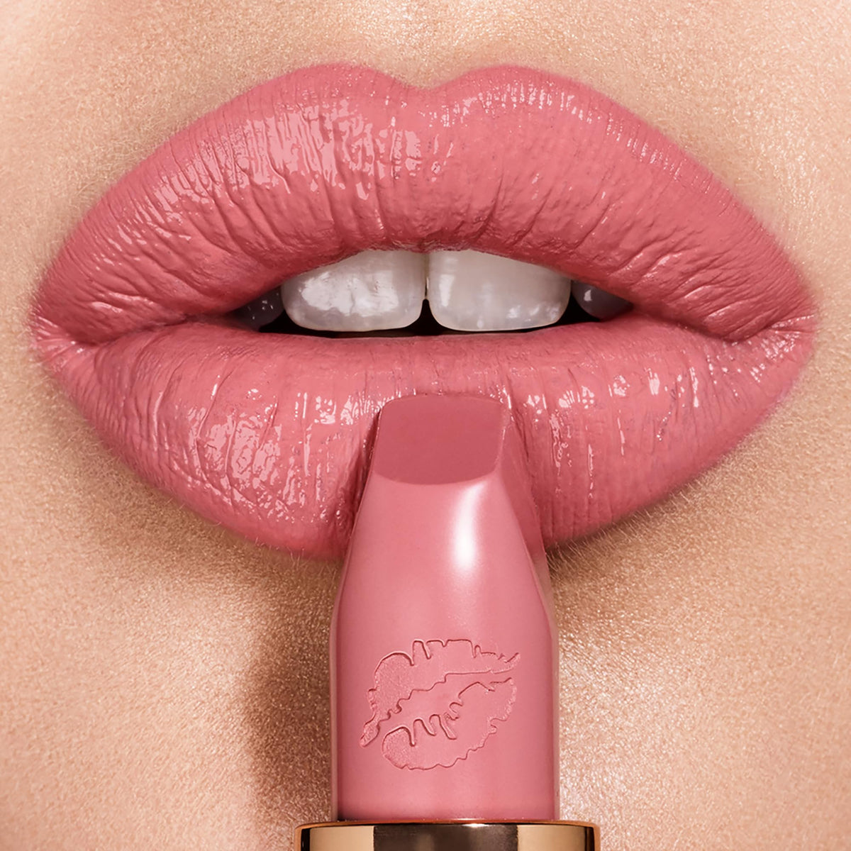 Charlotte Tilbury Liv It Up bullet close-up highlighting satin finish benefit
