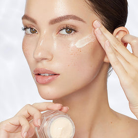 Charlotte Tilbury size comparison with 15ml jar beside everyday items, emphasizes travel-friendly benefit