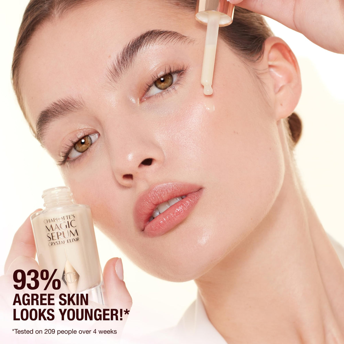 Charlotte Tilbury serum being applied to cheek showing hydration and smoothing benefit