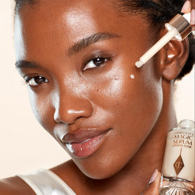 Charlotte Tilbury serum mixed with foundation for dewy makeup and luminous finish
