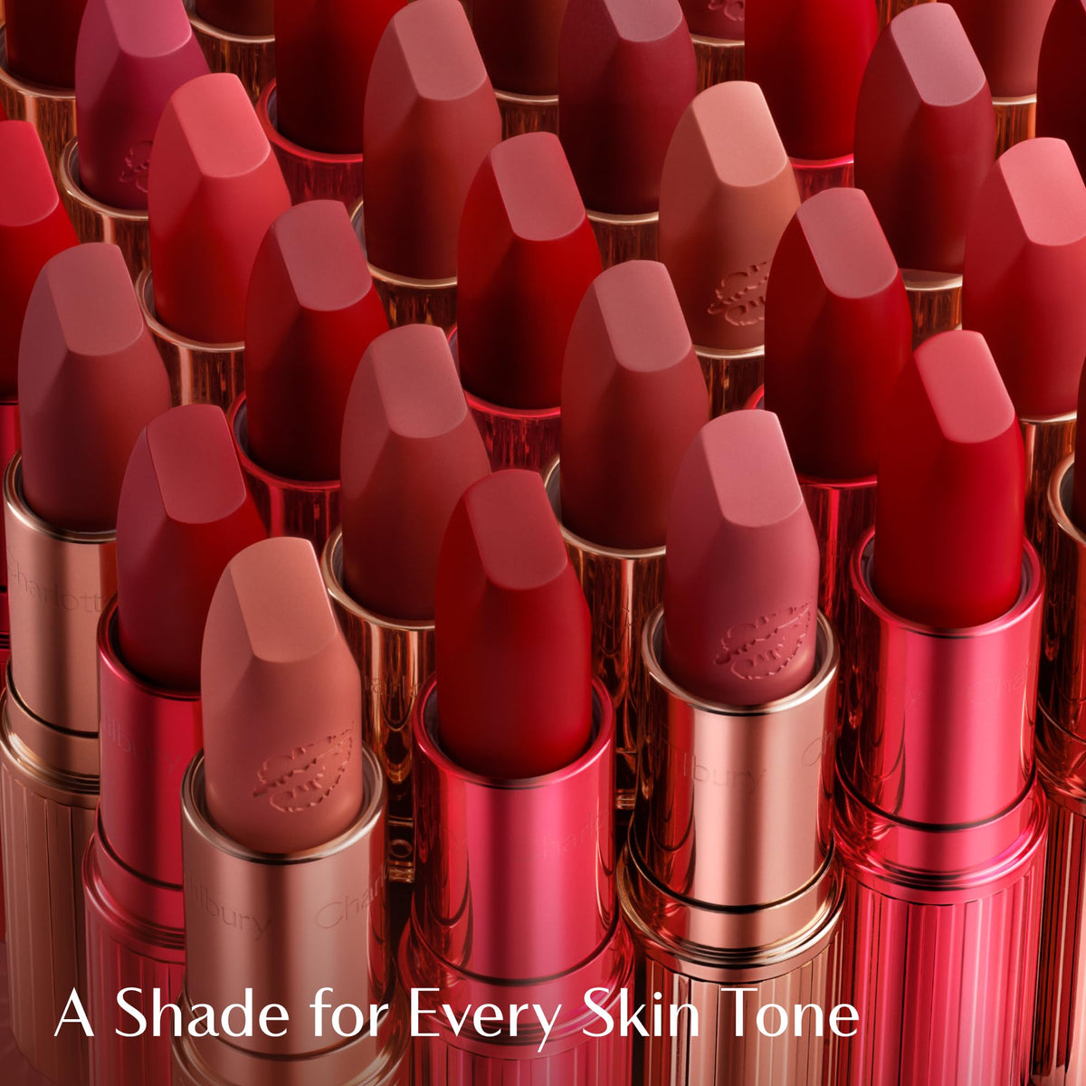 Charlotte Tilbury on-model lips close showing golden-coral glow and flattering finish