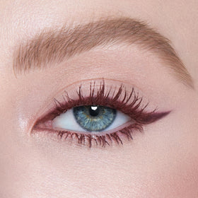 Charlotte Tilbury eyeliner texture swatch on skin showing blendable finish