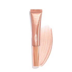 Charlotte Tilbury front packaging showing elegant wand and brand benefit of instant radiance