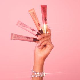Charlotte Tilbury blush in a makeup bag lifestyle shot implying easy touch-ups