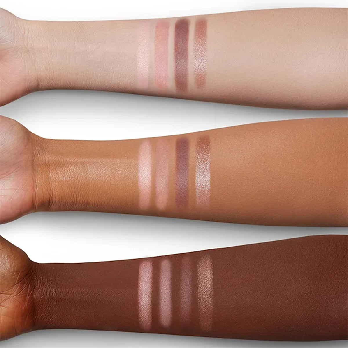 Charlotte Tilbury palette held in hand showing compact scale and travel convenience
