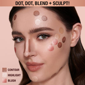 Charlotte Tilbury application on cheeks demonstrating rosy highlight and natural glow