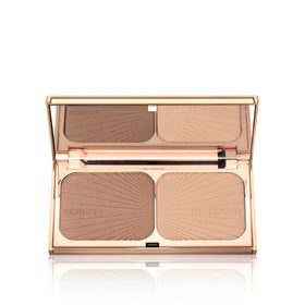 Charlotte Tilbury powder texture swatched with brush demonstrating blendable pigment