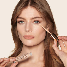 Charlotte Tilbury shade 3 fair swatches on arm showing true color match and brightening benefit
