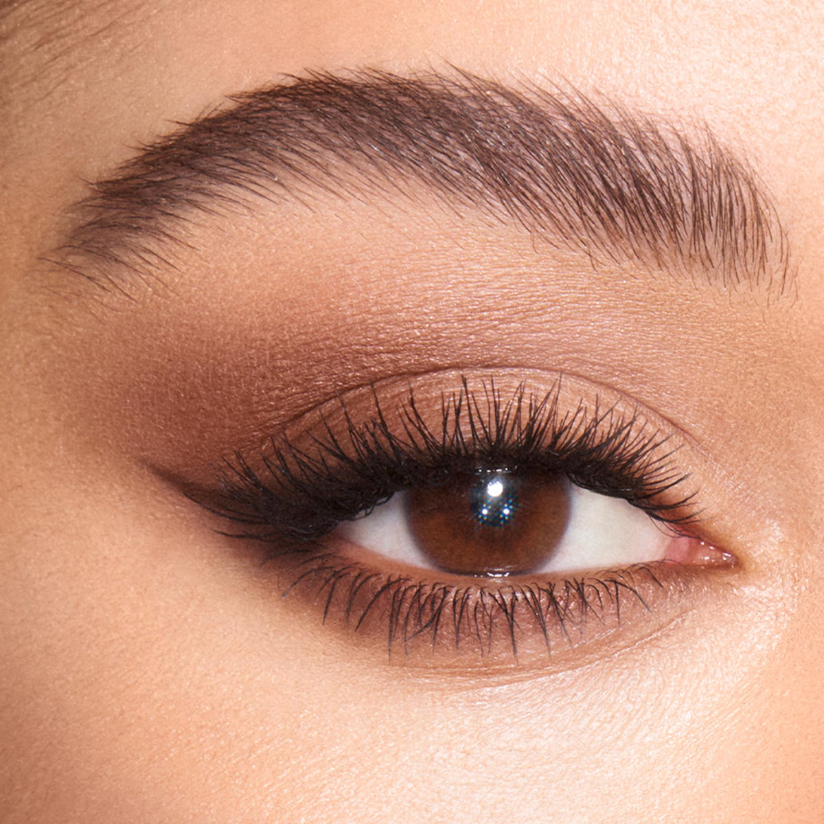 Charlotte Tilbury pressed powder close-up highlighting creamy texture and blendable finish
