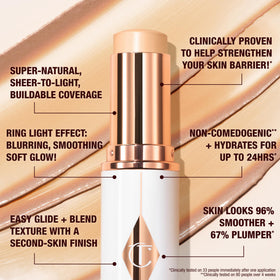 Charlotte Tilbury stick being applied to cheek for quick touch-up and natural coverage