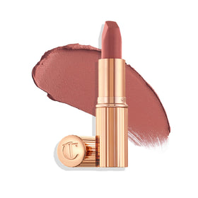 Charlotte Tilbury front view of Supermodel lipstick showing elegant tube and shade benefit