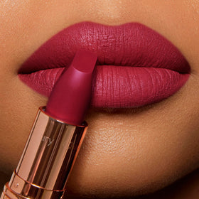 Charlotte Tilbury application on lips showing even coverage and defined edges