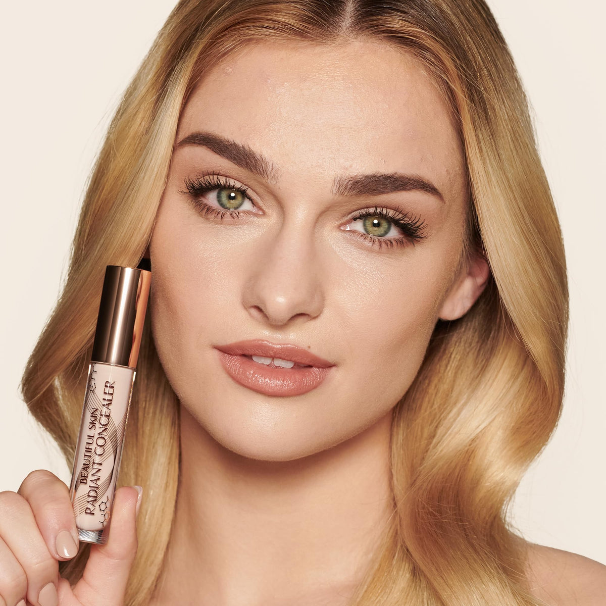 Charlotte Tilbury under-eye before and after image illustrating visible brightening benefit