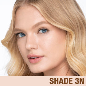 Charlotte Tilbury bottle styled on vanity for a hydrated, radiant routine