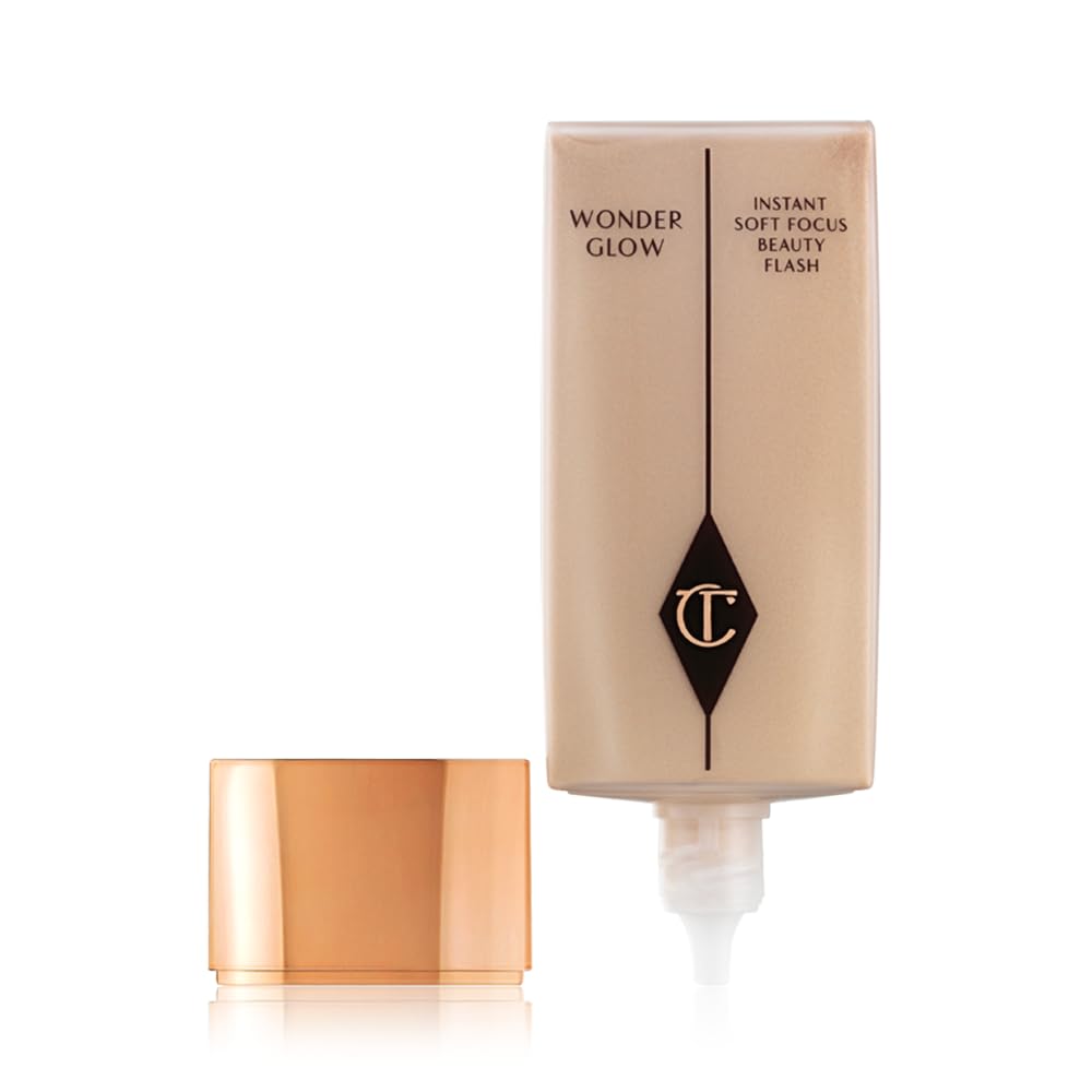 Charlotte Tilbury Wonderglow on vanity with lighting showing effortless glamour benefit
