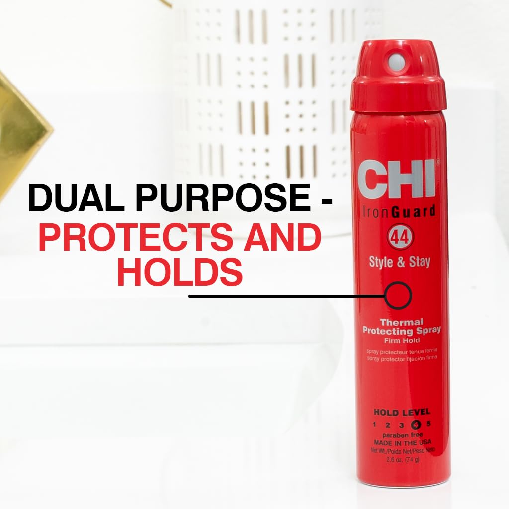 CHI 44 being sprayed during blowout to protect hair and lock style