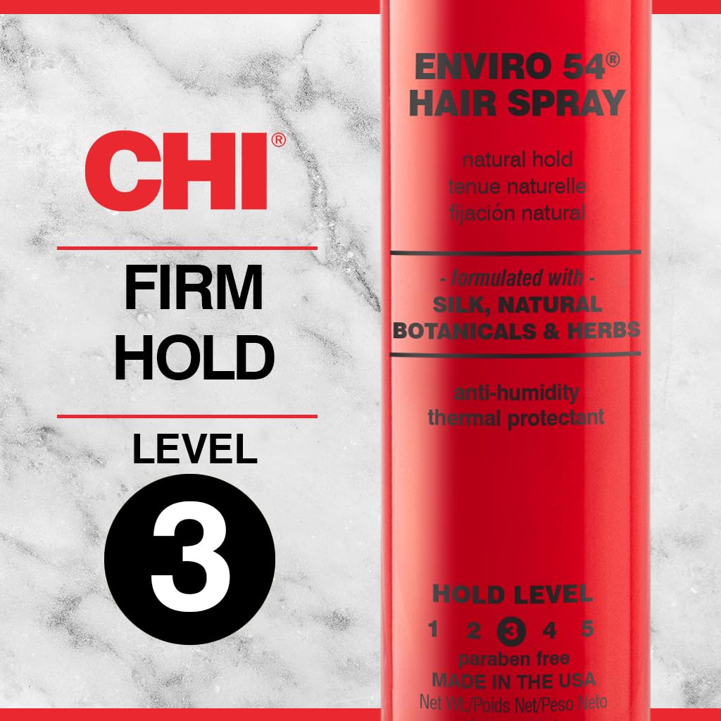 CHI Enviro 54 fine mist spraying onto styled hair for even hold