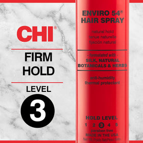 CHI Enviro 54 fine mist spraying onto styled hair for even hold