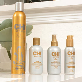 CHI bottle in hand for scale showing travel size convenience and portability