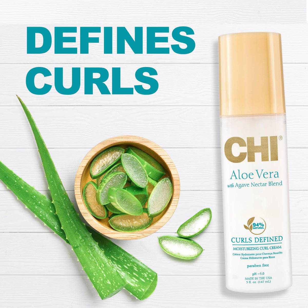 CHI lifestyle image of bouncy curls styled with product showing natural definition and gloss