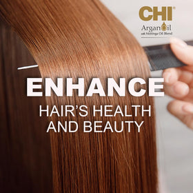 CHI close-up of moringa argan oil texture on hand for added shine and frizz control