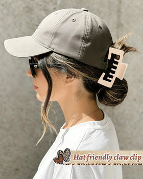 CHLINS profile of clip inserted in trucker hat snapback, secure hat-and-hair combination