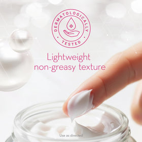 Cicatricure cream blended into skin showing quick absorption and glow
