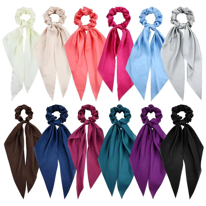 Cinaci front packaging showing 12 satin scrunchies and elegant colors for versatile styling