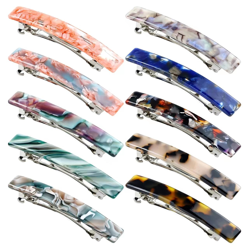 Cinaci front packaging display showing ten colorful acetate barrettes for versatile styling