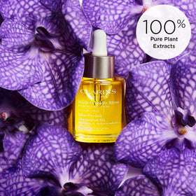 CLARINS packaging label showing natural plant extract claims and benefits