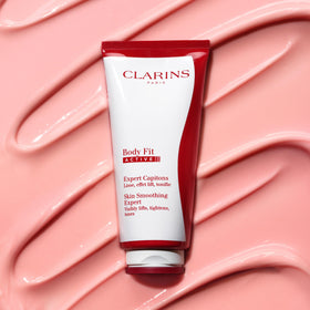Clarins Body Fit thigh application demo shows massage technique to help improve skin texture