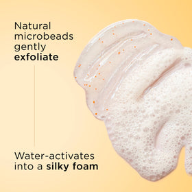 Clarins product applied to model's cheek demonstrating smooth application