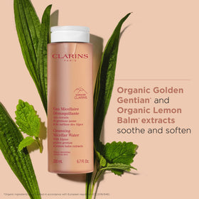 Clarins dispensing micellar water onto cotton pad demonstrating easy application