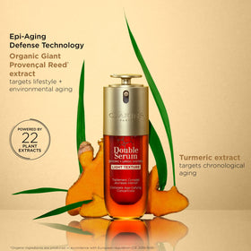 Clarins dual‑phase mix in palm highlighting active botanical combination