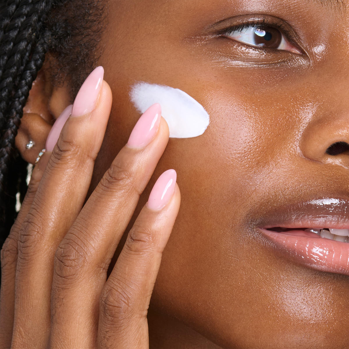 Clarins product label close-up highlighting active ingredients and clarity