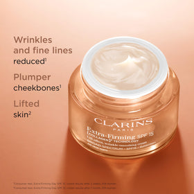 Clarins cream texture close-up showing creamy smoothness and absorption benefit
