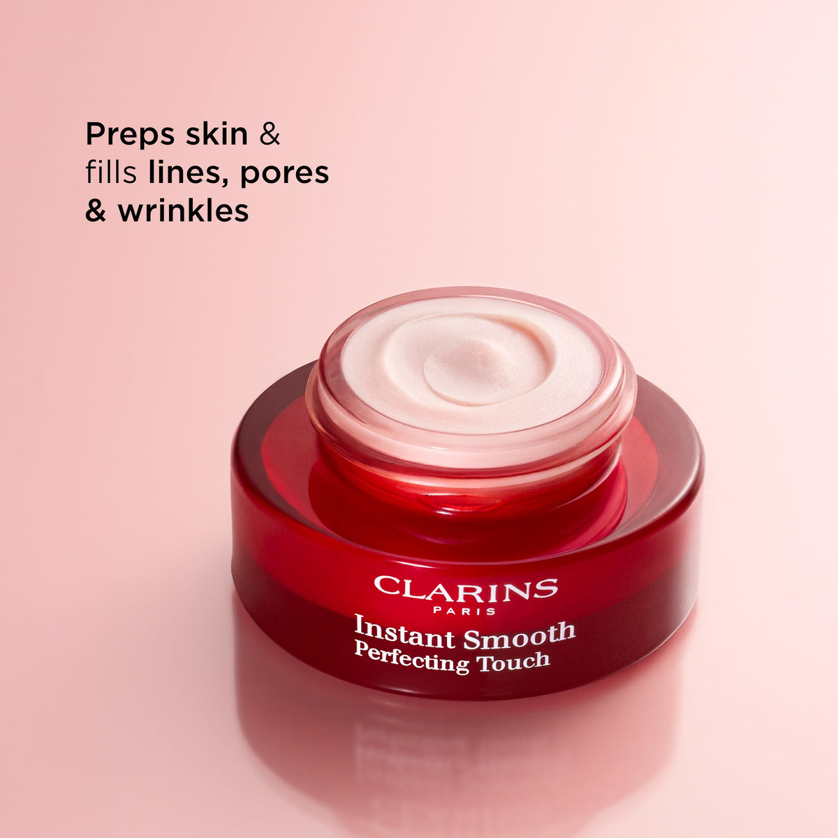 Clarins bottle open dispensing primer highlighting easy application benefit