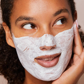 CLARINS on bathroom vanity with towel, portrays ready-to-use daily contouring boost